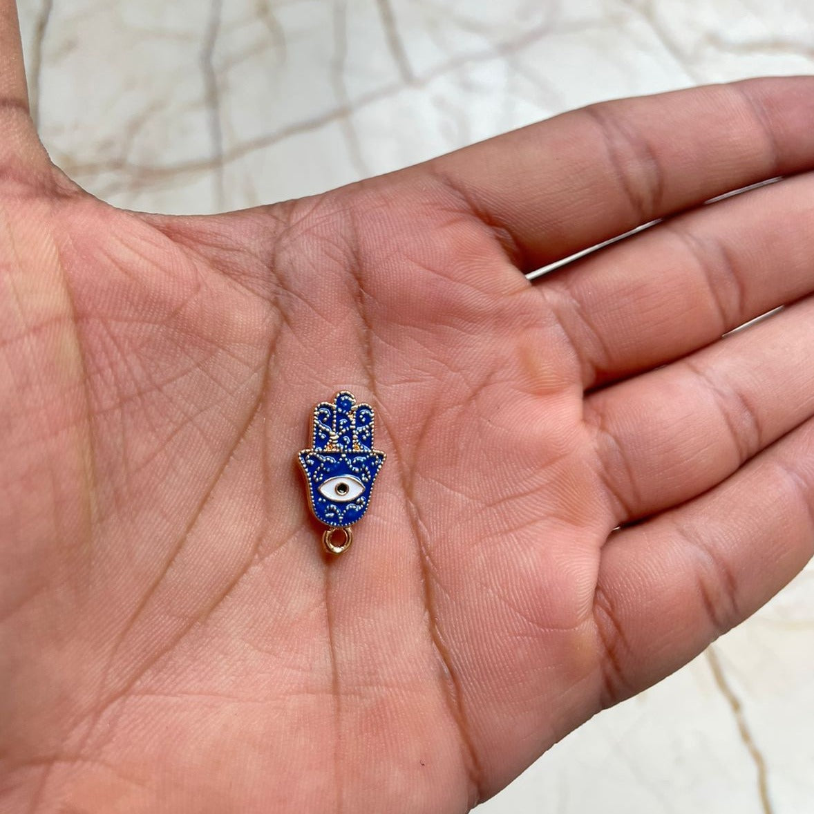 Evil eye Hamsa hand charm